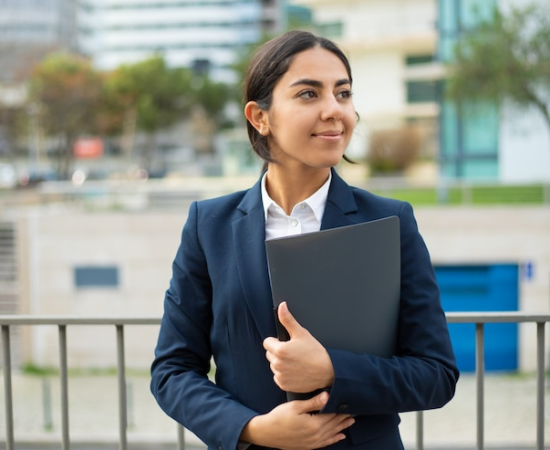 happy-businesswoman-holding-fold happy-businesswoman-holding-fold